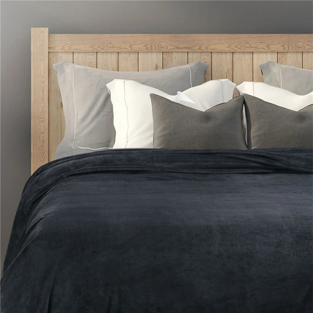 Plaid noir cocooning en tissu moelleux et confortable