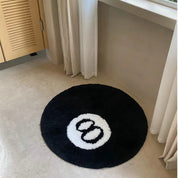 Tapis rond noir avec chiffre 8 blanc