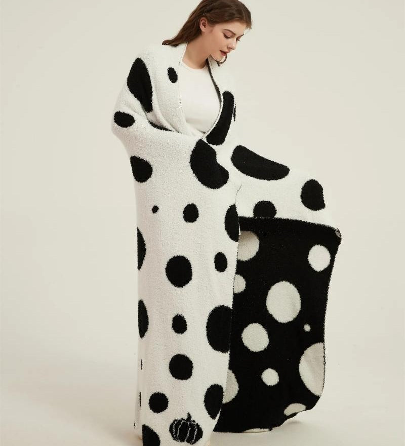 Gros plaid blanc et noir en matière polaire