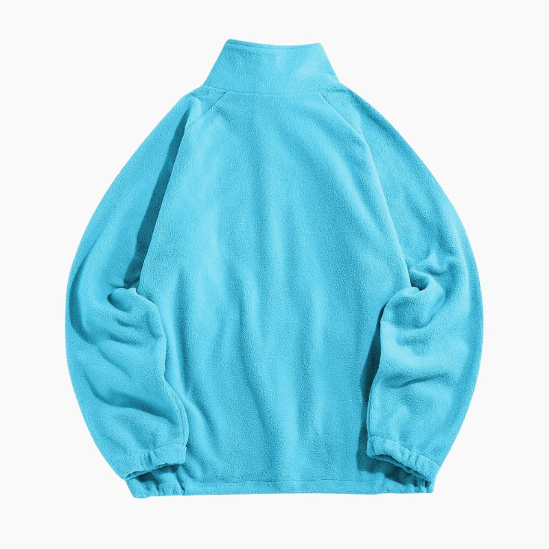 Pull duveteux de couleur bleu turquoise pour femme