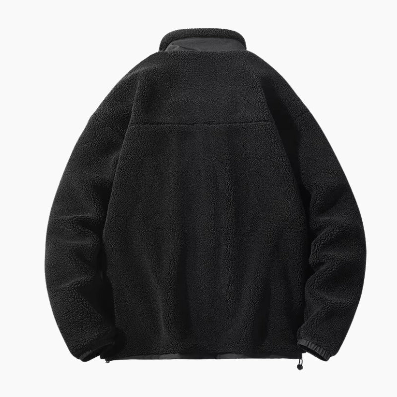 Veste noire rembourrée en matière Pilou Pilou pour homme.