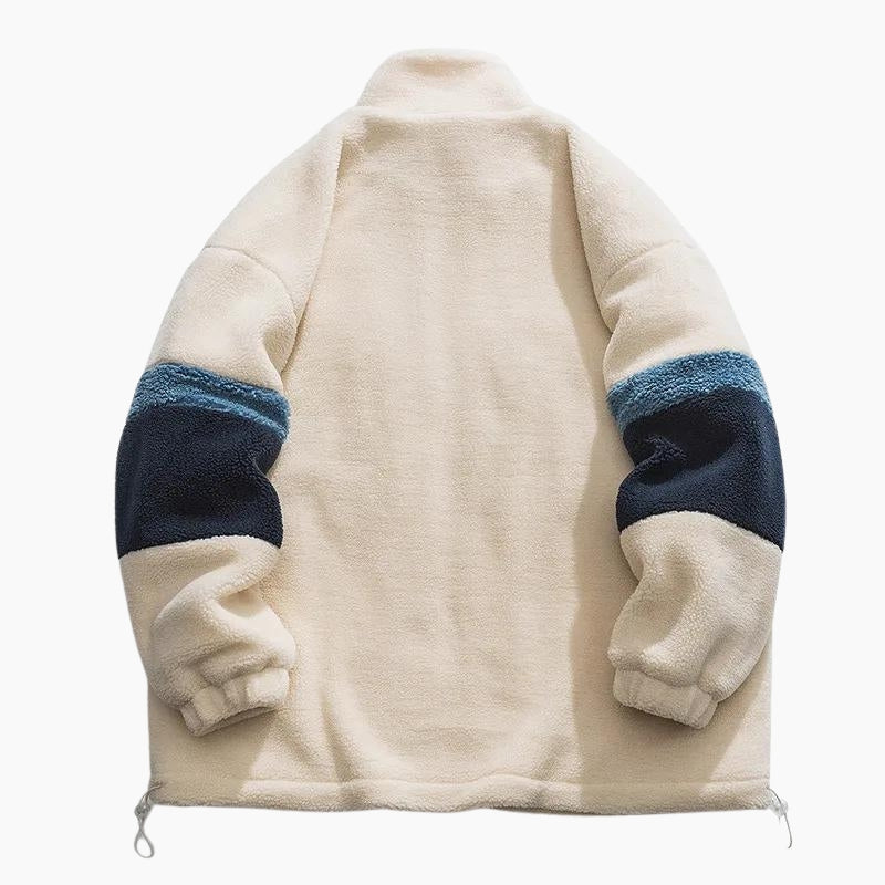 Manteau de couleur crème et bleu marine en laine de Pilou Pilou pour homme.