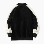 Pull noir et blanc à motif en matière moumoute pour homme