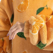 pull plaid pilou pilou motifs oranges