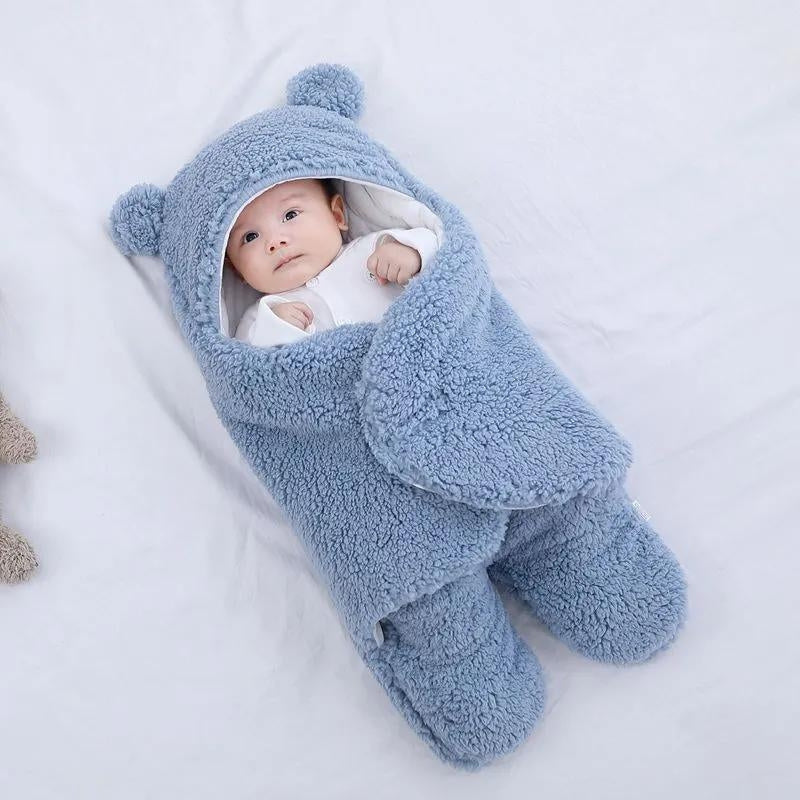 Sac de couchage bleu pour bébé en matière Pilou Pilou