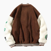 Veste style rétro de couleur marron et blanche en matière Pilou Pilou pour homme.