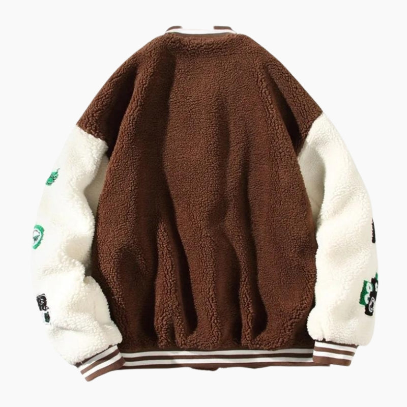Veste style rétro de couleur marron et blanche en matière Pilou Pilou pour homme.