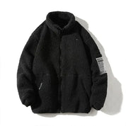Veste de couleur noire en matiere Pilou Pilou style bouclette pour femme