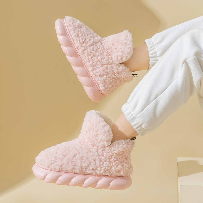 Chausson rose en matière peluche 