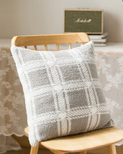 Coussin fourrure gris