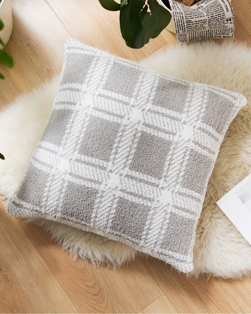Coussin à carreaux en fourrure gris