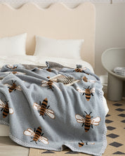 Couverture douce bleu ciel avec motifs d'abeilles