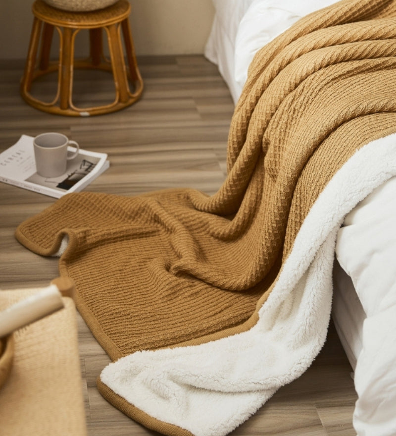 Plaid en fausse fourrure de couleur marron