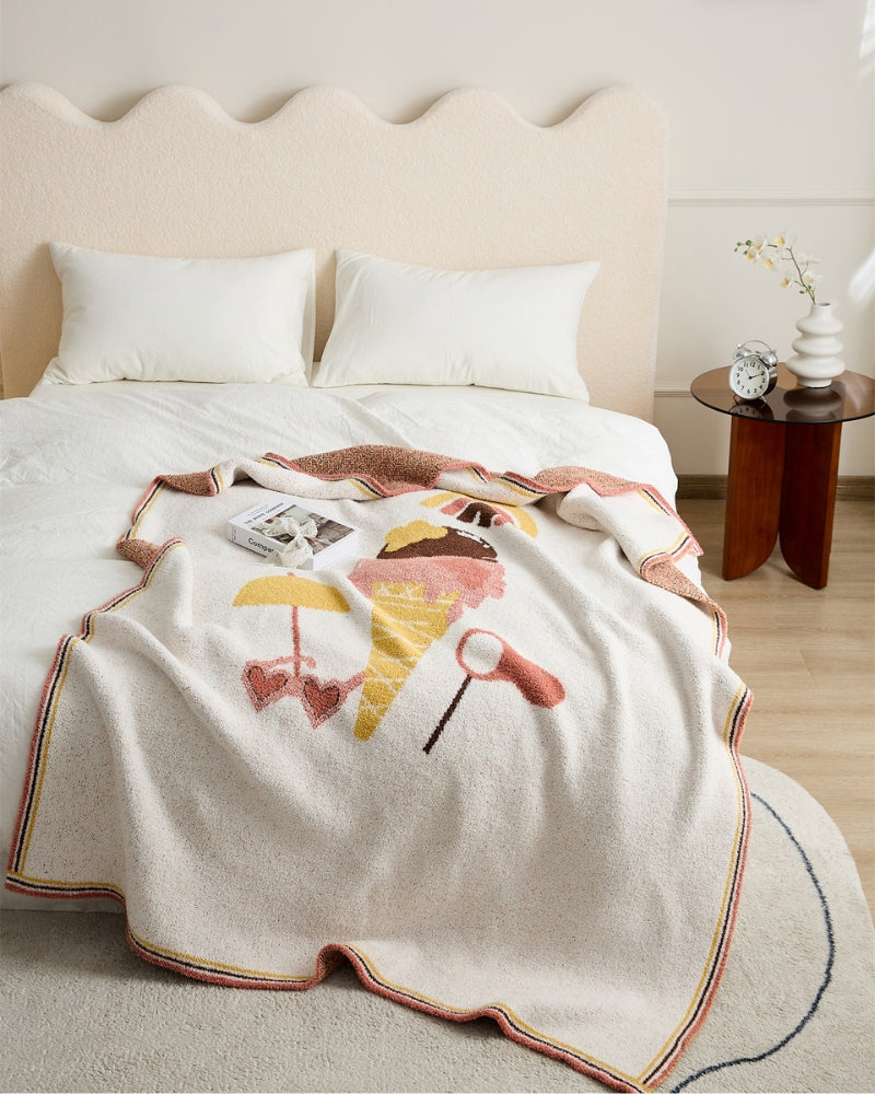 Plaid moelleux couleur crème avec motif amusant