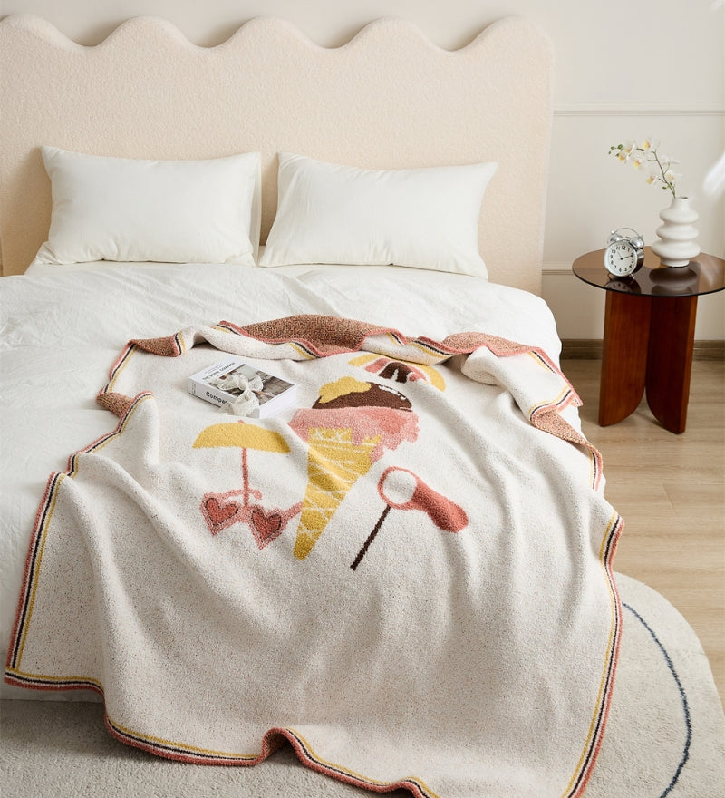 Plaid moelleux couleur crème avec motif amusant