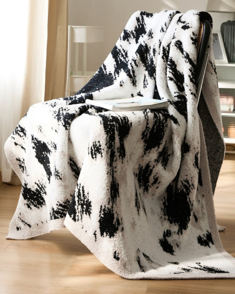 Plaid noir et blanc en effet mouton