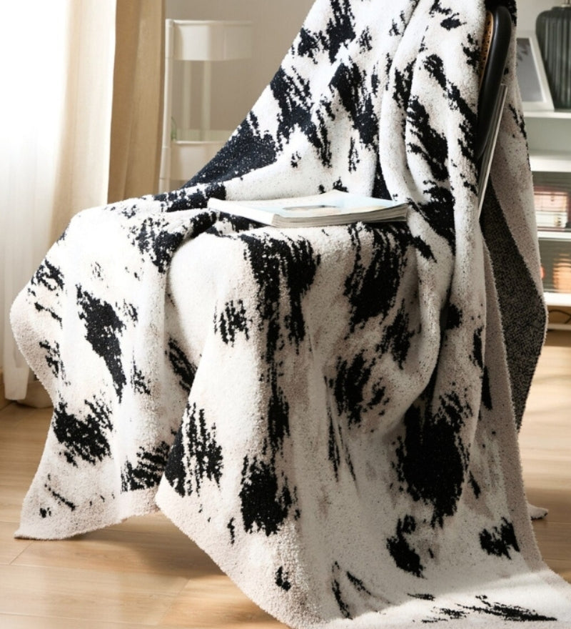 Plaid noir et blanc en effet mouton