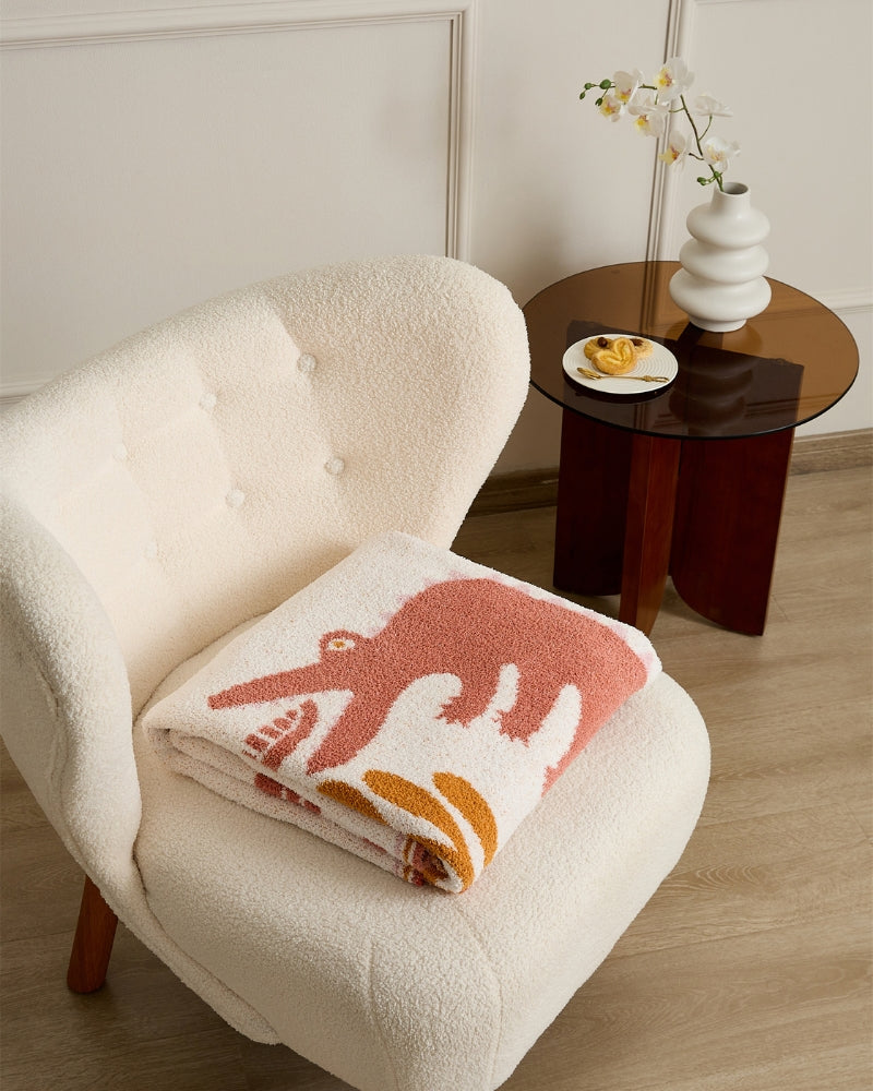 Plaid en matière polaire avec motif rose