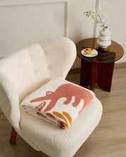 Plaid en matière polaire avec motif rose