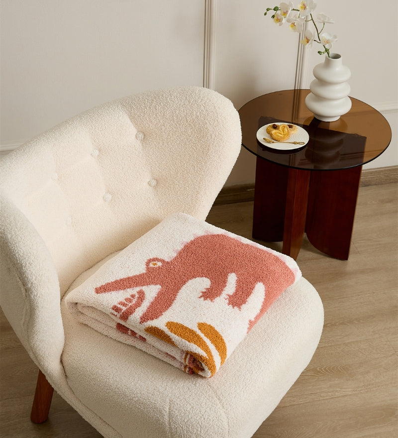 Plaid en matière polaire avec motif rose